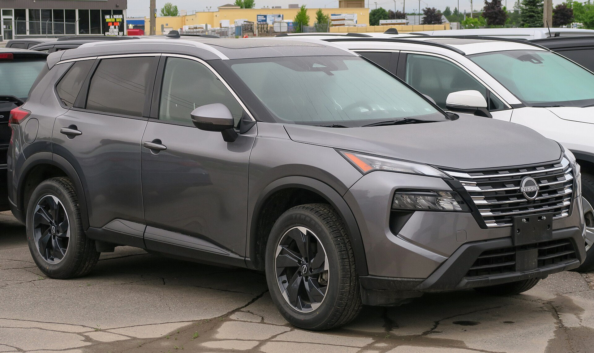 Gray Nissan Rogue SUV without a visible license plate