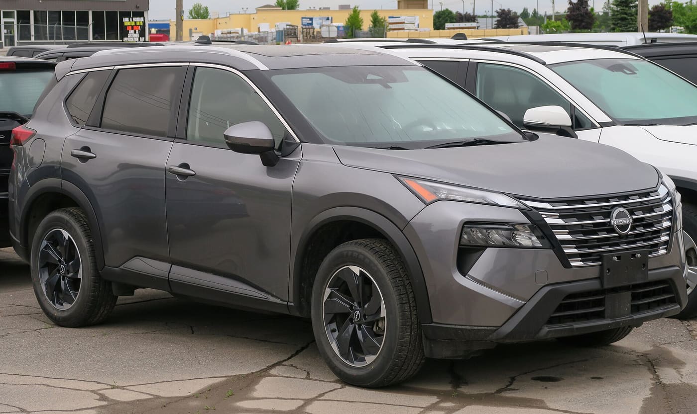 Gray Nissan Rogue SUV without a visible license plate