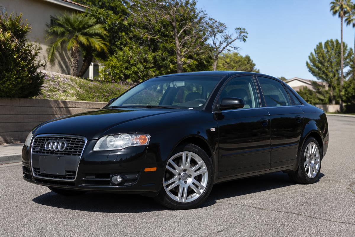 Black Audi A4 sedan without a visible license plate